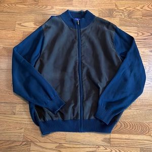 Suede front and cotton letterman sweater with ribbed cuff and waist. Size large.